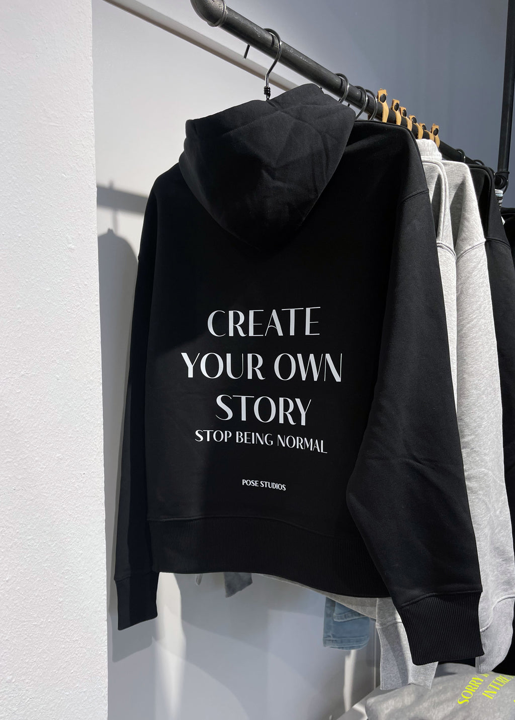 Hoodie Your Story, Black Pose